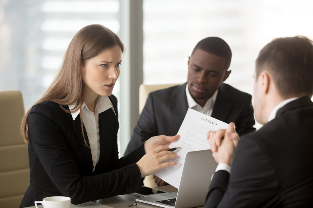 business lawyers negotiating during a contract dispute